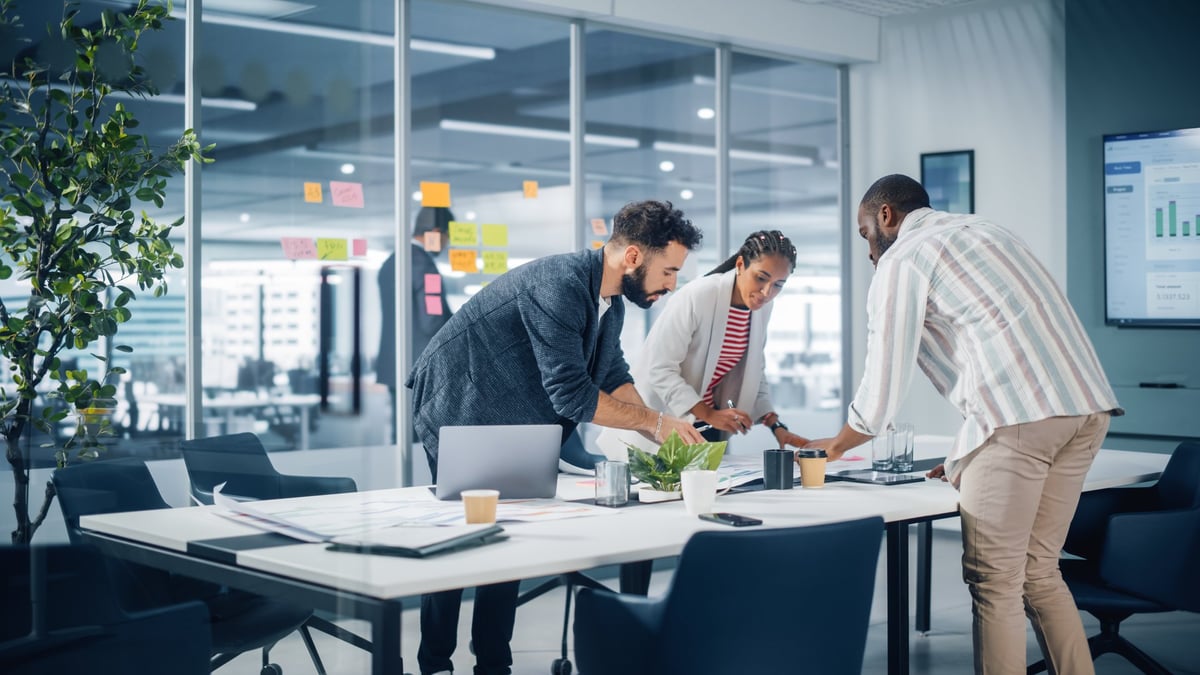 Business owners discussing strategy around a conference table